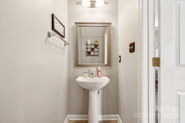 bathroom featuring baseboards