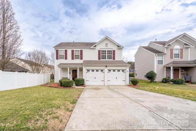 traditional home with a front lawn, fence, a garage, and driveway