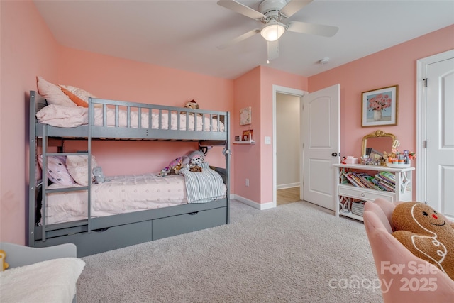 bedroom featuring baseboards, carpet floors, and ceiling fan