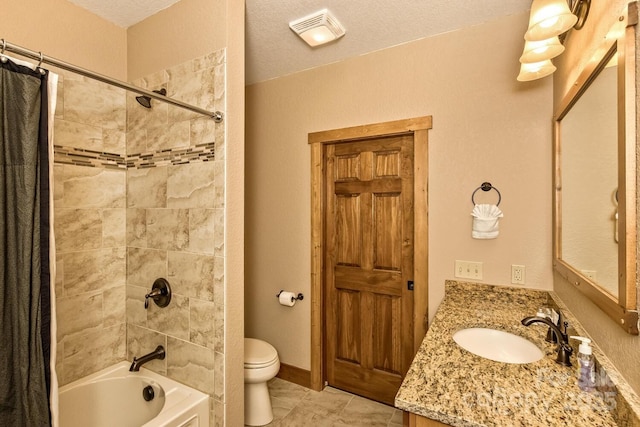 full bath with vanity, visible vents, tile patterned flooring, shower / bath combo with shower curtain, and toilet