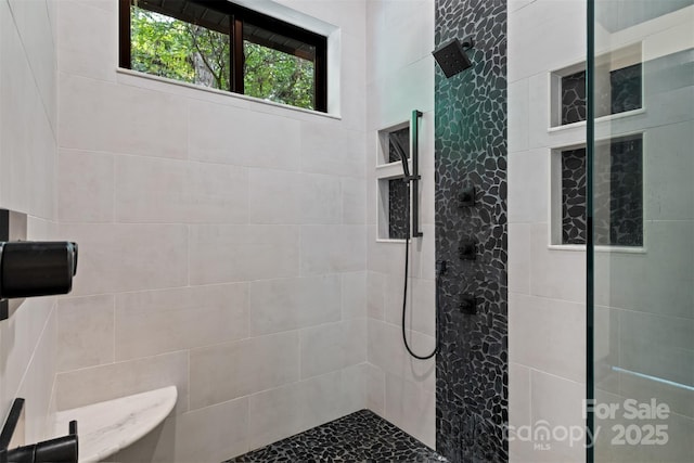 full bathroom with a walk in shower