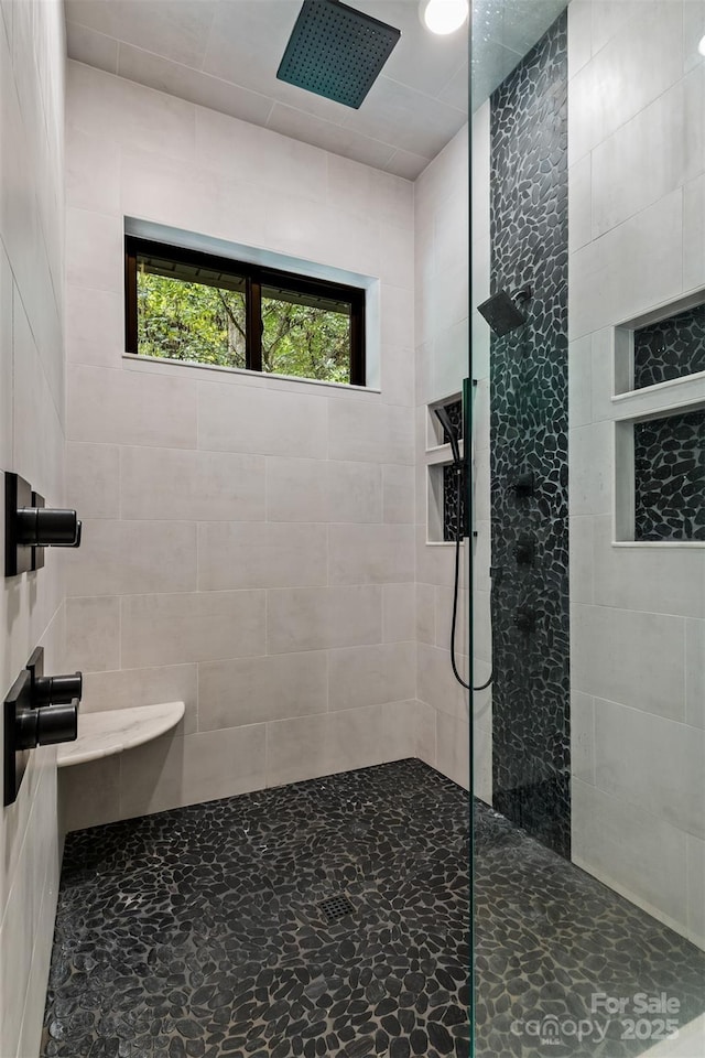 full bath featuring walk in shower