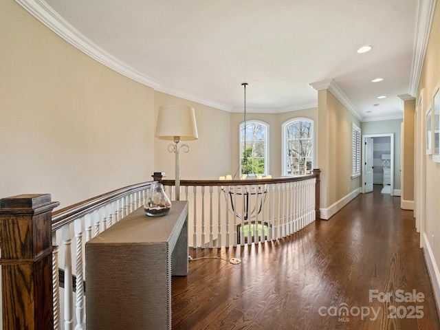 hall with recessed lighting, baseboards, dark wood finished floors, and ornamental molding