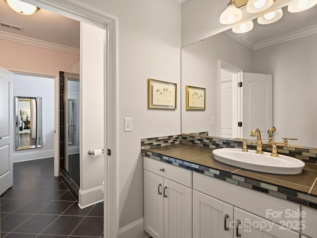 full bathroom with tile patterned floors, visible vents, a shower stall, crown molding, and decorative backsplash