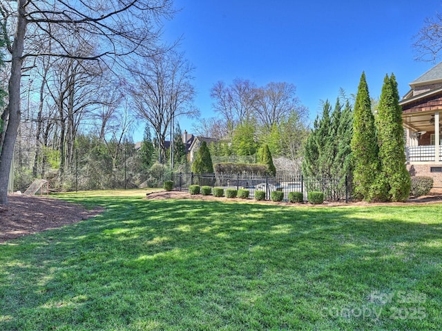 view of yard with fence