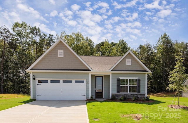 view of front of house featuring a garage, stone siding, concrete driveway, and a front yard