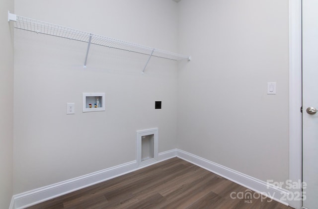 clothes washing area with baseboards, hookup for an electric dryer, dark wood-style floors, and laundry area