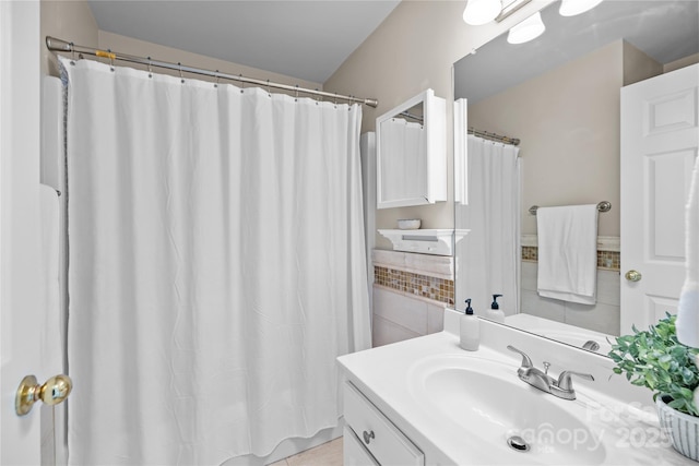 bathroom featuring vanity, tile walls, and a shower with shower curtain