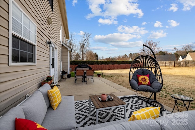 view of patio with an outdoor hangout area, a fenced backyard, and outdoor dining space