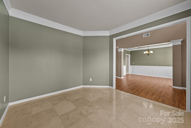 252 Legend Dr, Rock Hill, SC 29732 - unfurnished room featuring a chandelier, crown molding, ornate columns, tile patterned floors, and baseboards