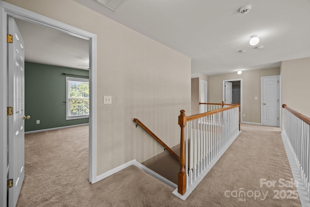 252 Legend Dr, Rock Hill, SC 29732 - hall with an upstairs landing, carpet floors, and baseboards