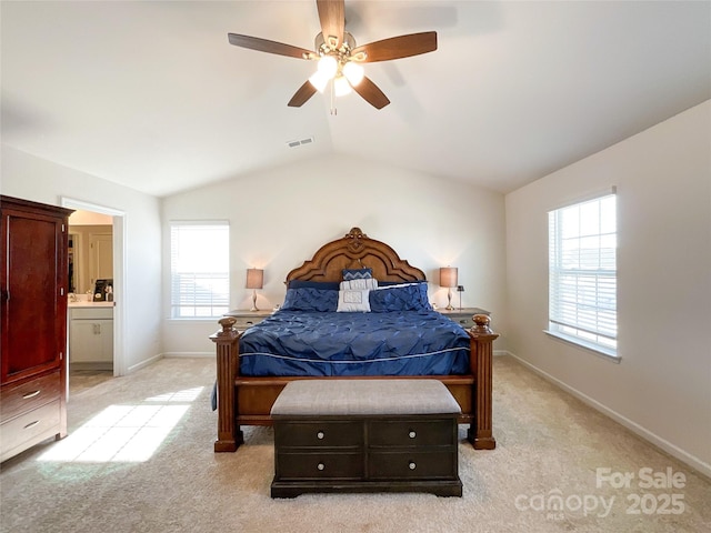 bedroom featuring visible vents, ceiling fan, baseboards, lofted ceiling, and light carpet