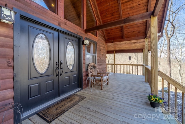 entrance to property featuring covered porch