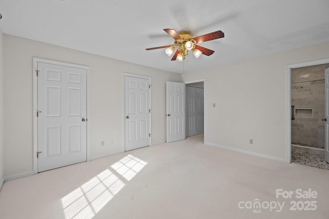 234 Pointe Cir, Rock Hill, SC 29732 - unfurnished bedroom with carpet floors, multiple closets, ensuite bath, and ceiling fan