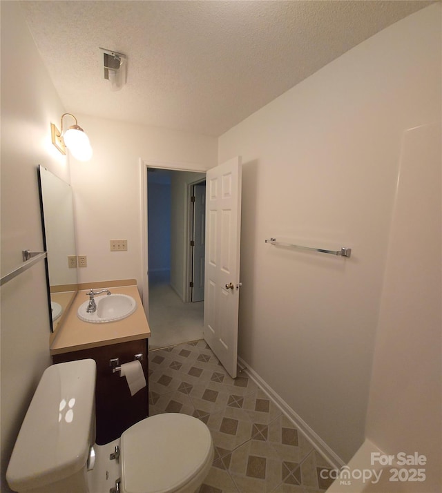 234 Pointe Cir, Rock Hill, SC 29732 - bathroom with a textured ceiling, vanity, and tile patterned floors