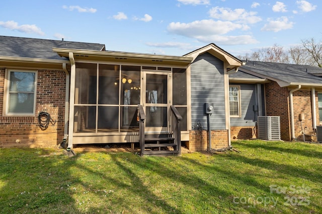 234 Pointe Cir, Rock Hill, SC 29732 - back of house with a yard, a sunroom, and brick siding