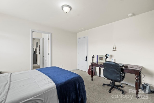 bedroom with carpet flooring and baseboards