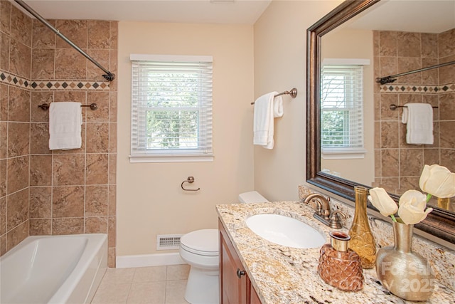 full bath featuring vanity, visible vents, bathtub / shower combination, tile patterned floors, and toilet