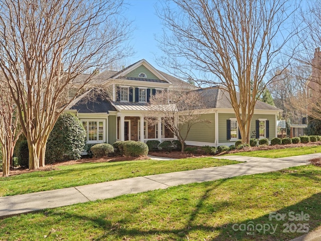 view of front of home featuring a front lawn