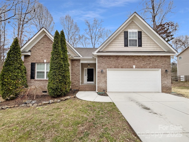 view of front of property featuring concrete driveway, brick siding, and crawl space