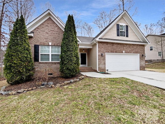 view of front of house featuring entry steps, concrete driveway, brick siding, and a front lawn