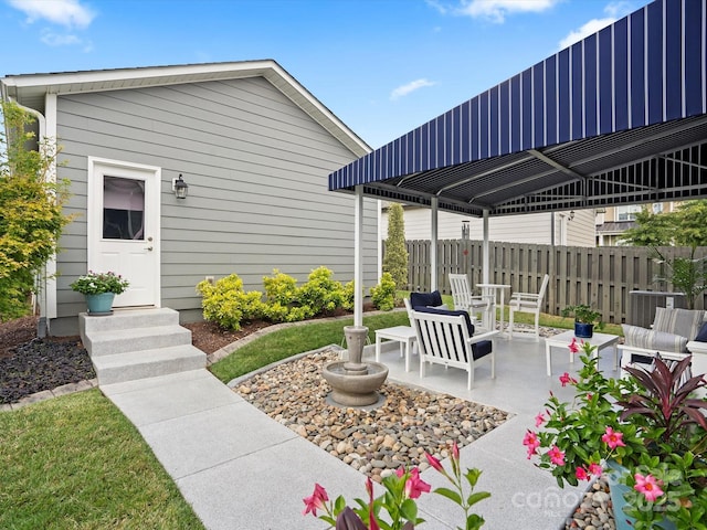 view of patio with fence