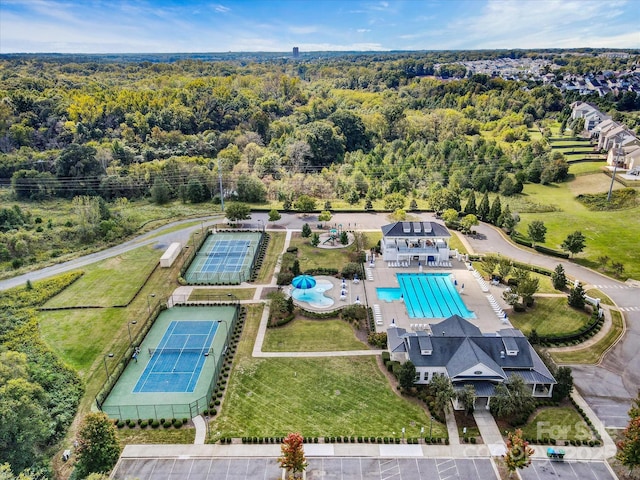 bird's eye view featuring a forest view