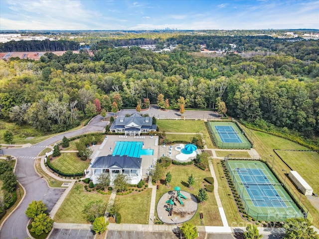 drone / aerial view featuring a view of trees