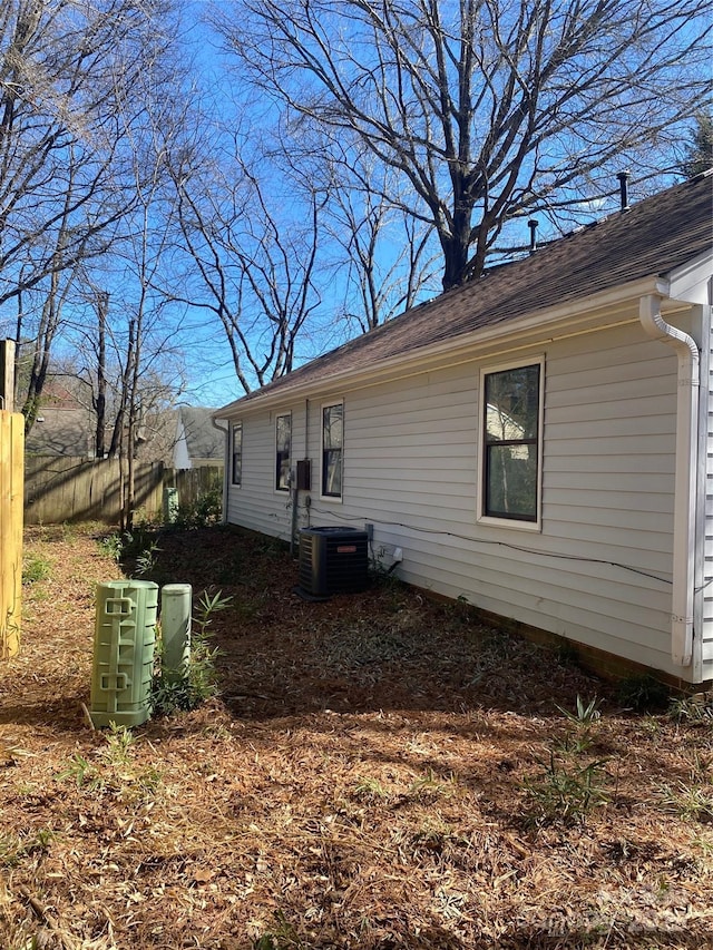 view of home's exterior with central AC