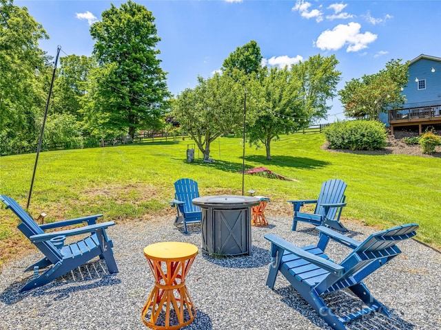 view of yard with a patio area and an outdoor fire pit