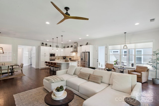 4922 Looking Glass Trl, Denver, NC 28037 - living room featuring crown molding, ceiling fan, dark wood-style flooring, and recessed lighting
