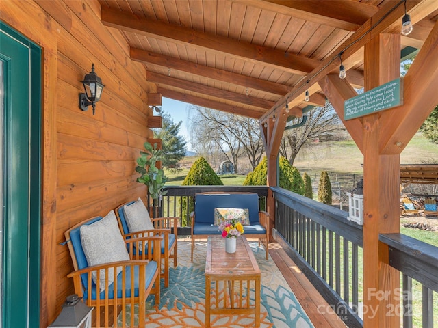 balcony with an outdoor hangout area