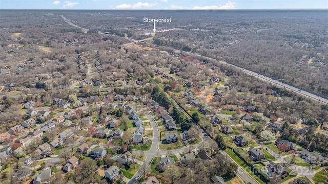bird's eye view featuring a forest view