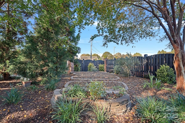 view of yard with fence