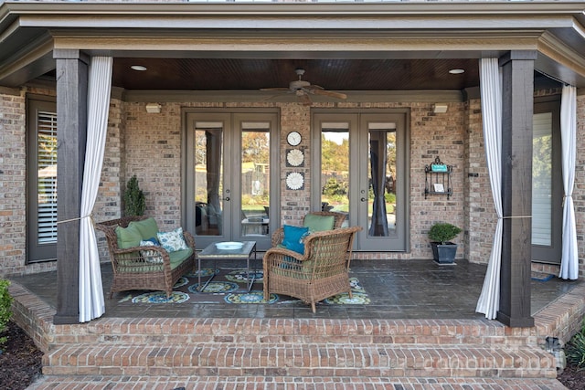 view of patio with french doors and a ceiling fan