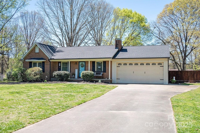 single story home with brick siding, driveway, a front yard, and fence