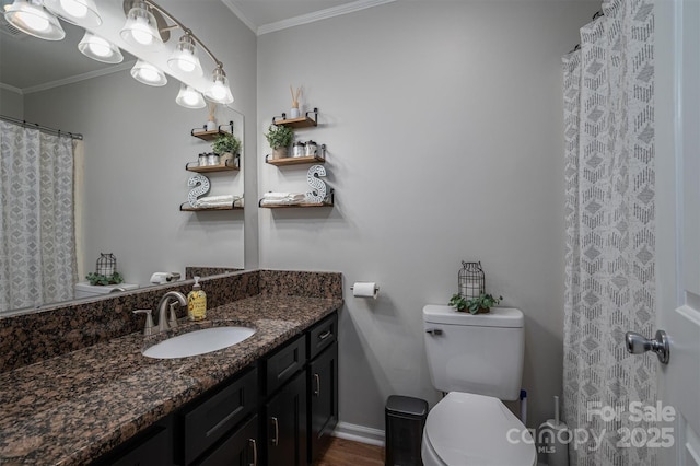 full bathroom featuring vanity, toilet, baseboards, and ornamental molding