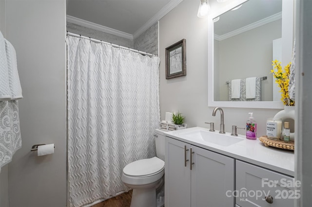 full bath featuring vanity, crown molding, toilet, and wood finished floors