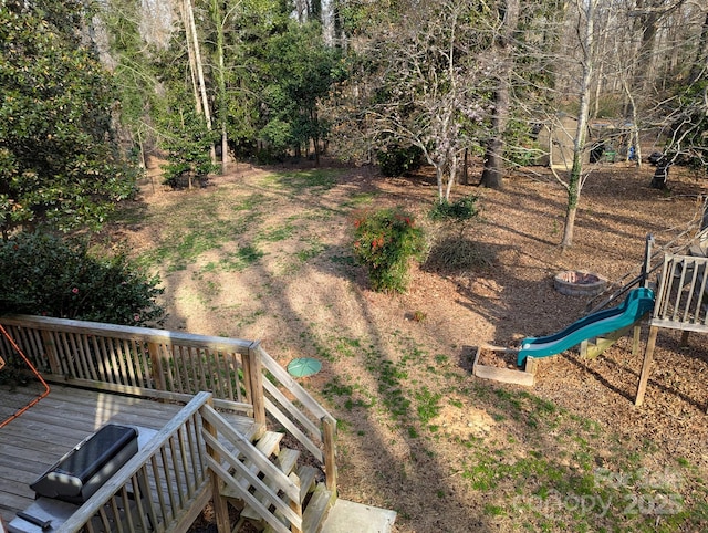 view of yard with a deck