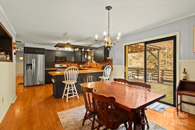 dining room with light wood-style floors