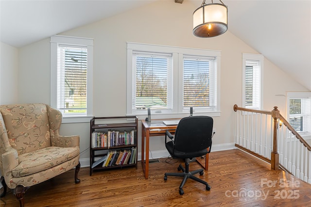 office area featuring lofted ceiling, plenty of natural light, and wood finished floors