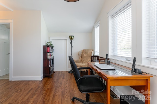 office area with baseboards, lofted ceiling, and wood finished floors