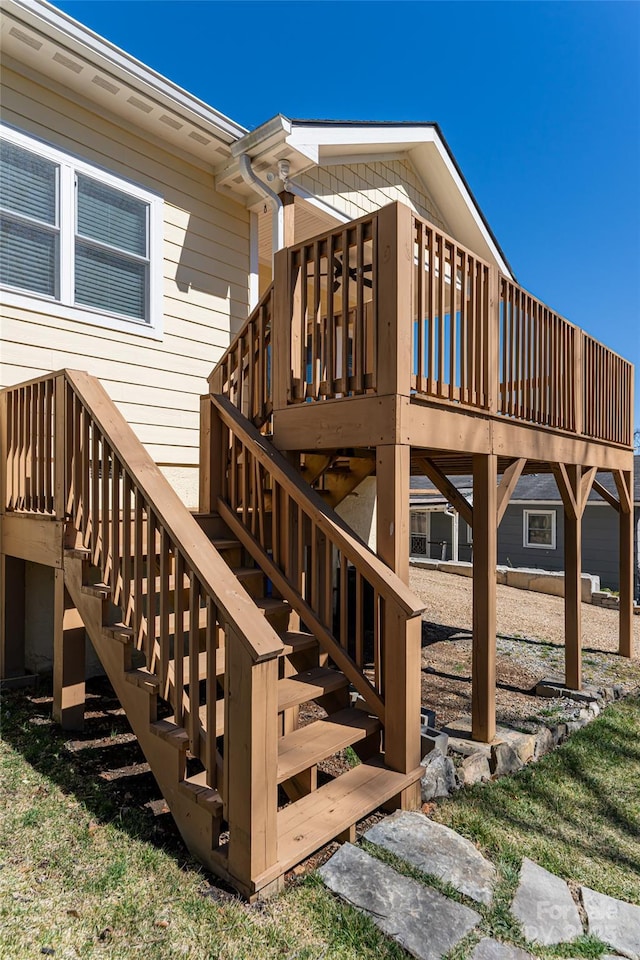 wooden terrace featuring stairway