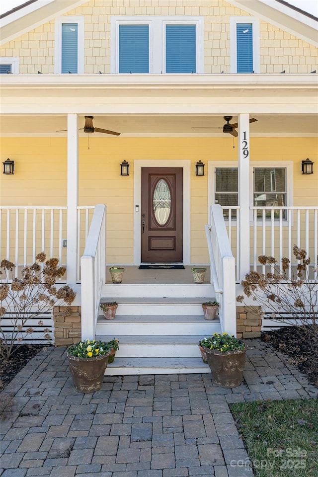 entrance to property featuring covered porch