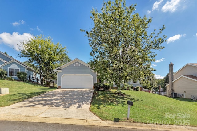 view of front of home with central AC unit, concrete driveway, and a front lawn