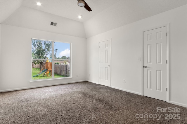 unfurnished bedroom with visible vents, baseboards, carpet, lofted ceiling, and ceiling fan