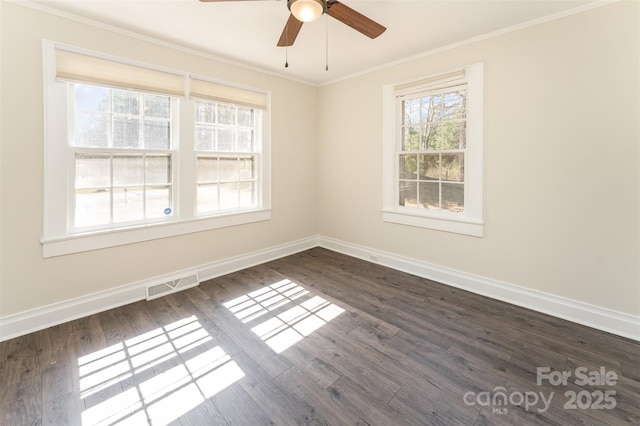 unfurnished room with baseboards, visible vents, dark wood-style flooring, ornamental molding, and ceiling fan