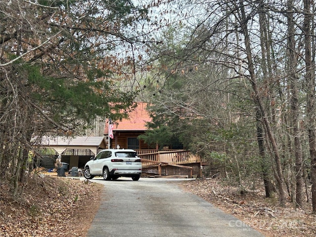 view of front of home featuring aphalt driveway