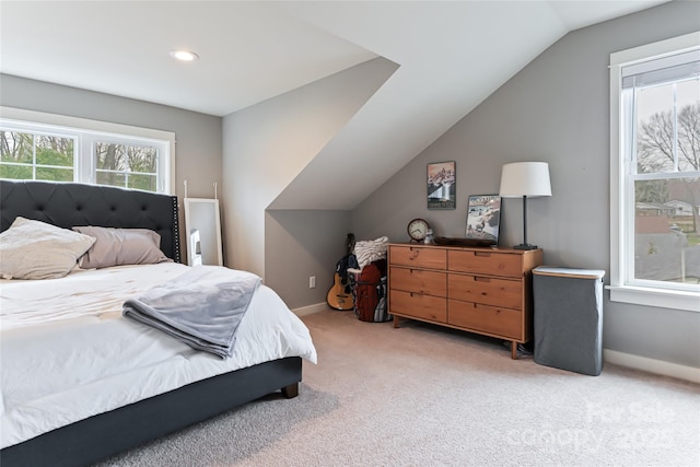 bedroom with recessed lighting, baseboards, light carpet, and lofted ceiling