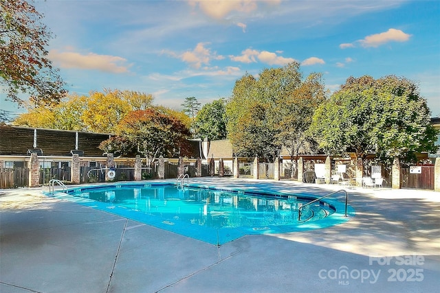 community pool with fence